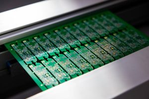 SMT allows for higher component density because smaller parts can be mounted on both sides of the PCB.